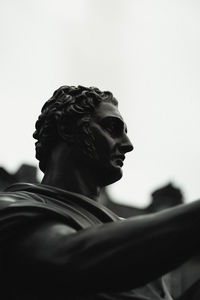 Low angle view of statue against clear sky