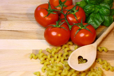 High angle view of tomatoes on cutting board