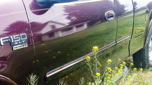 Cars on road against sky