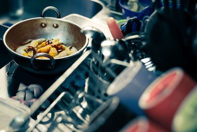 High angle view of prawns in utensil on kitchen counter