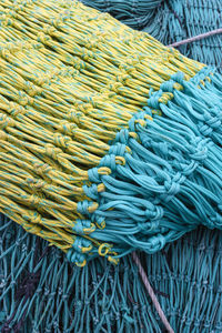 Colorful fishing nets lying in a heap