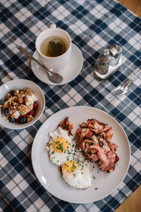 High angle view of breakfast served on table