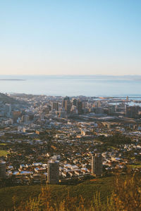 Cityscape with sea in background