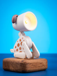 Close-up of stuffed toy against blue background
