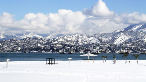 Scenic view of snowcapped mountains against sky