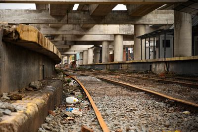 Railroad tracks under bridge