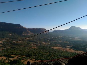 Scenic view of mountains against clear sky