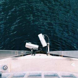 Security camera hanging over sea