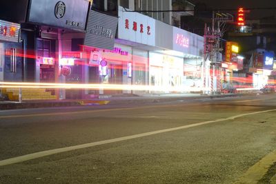 Light trails on city street at night