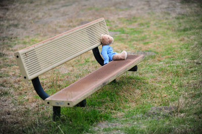 Toy on bench outdoors