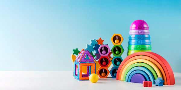 High angle view of multi colored toys against blue sky