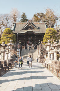 Group of people in front of building