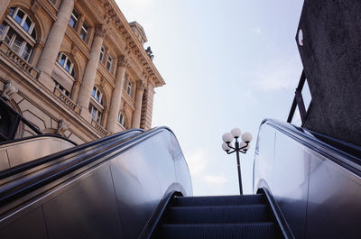 Low angle view of staircase against sky