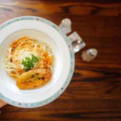 High angle view of pasta in plate on table