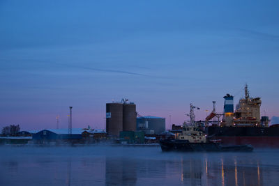 View of harbor at sunset