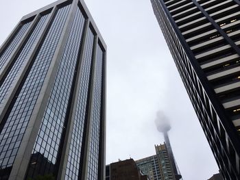 Low angle view of modern buildings against sky
