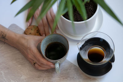 High angle view of coffee cup on table