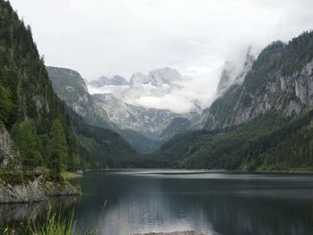 Scenic view of lake with mountains in background