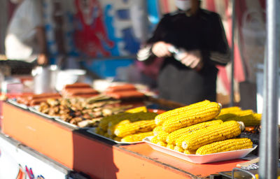 Close-up side view of corn cobs on display