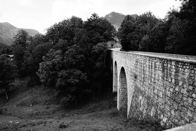 View of bridge leading towards mountain