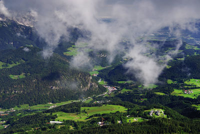 Scenic view of waterfall against sky