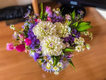 High angle view of purple flowers on table