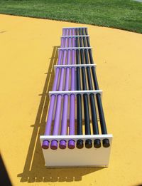 High angle view of multi colored pencils on field