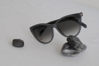 Close-up of sunglasses on table