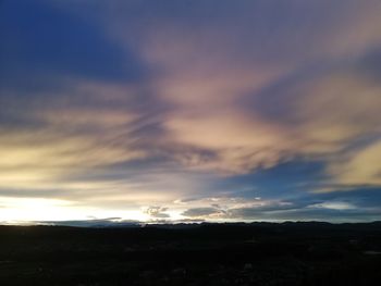 Scenic view of dramatic sky during sunset