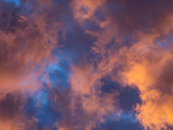 Low angle view of dramatic sky during sunset