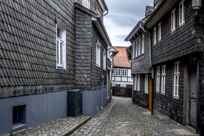 Narrow alley along buildings