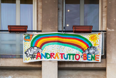 Italians locked up in the quarantined house display the rainbow flag on the windows of the buildings