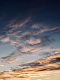 Low angle view of dramatic sky during sunset