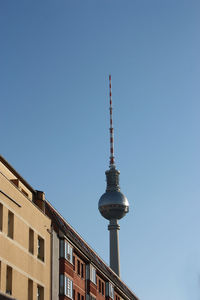 Low angle view of eiffel tower against clear sky