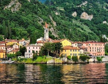 Buildings by river