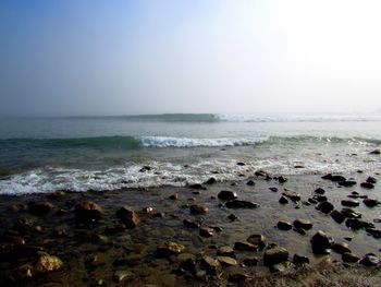 Scenic view of sea against clear sky