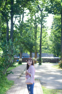 Rear view of woman walking in park