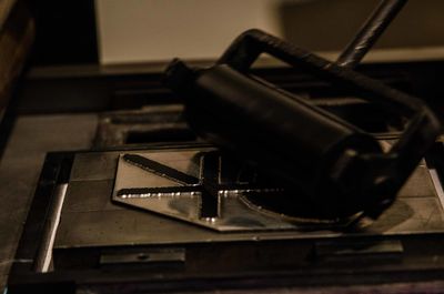 Close-up of telephone on table