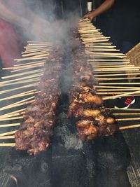 Close-up of meat on barbecue grill