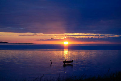Scenic view of sunset over sea