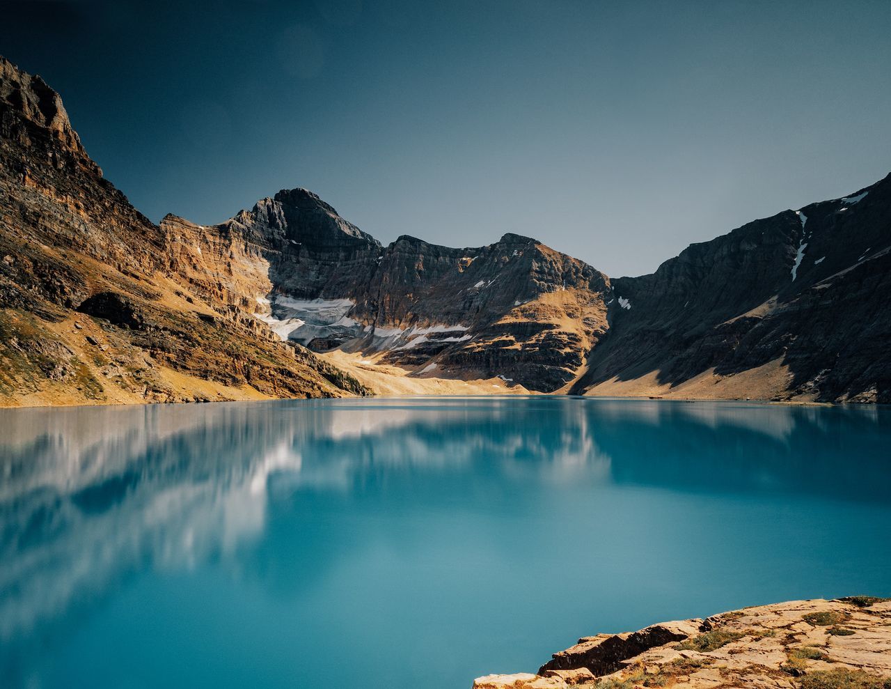 mountain, scenics - nature, water, beauty in nature, tranquil scene, sky, lake, tranquility, mountain range, non-urban scene, nature, no people, idyllic, waterfront, day, reflection, blue, clear sky, cold temperature, outdoors, formation, turquoise colored