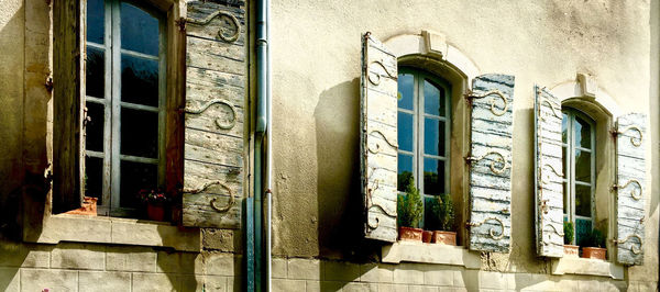 Low angle view of window in old building