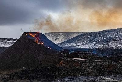 Panoramic view of volcanic landscape against sky