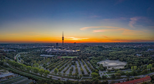 High angle view of buildings against sky during sunset