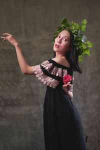 Portrait of a beautiful young woman looking up