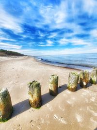 Scenic view of beach against sky