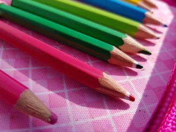 High angle view of colored pencils on table