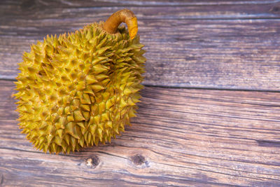 Close-up of yellow fruit on table