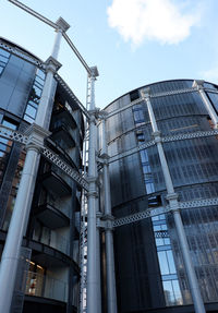 Low angle view of factory against sky