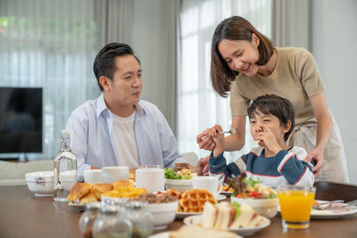 Family having food at home